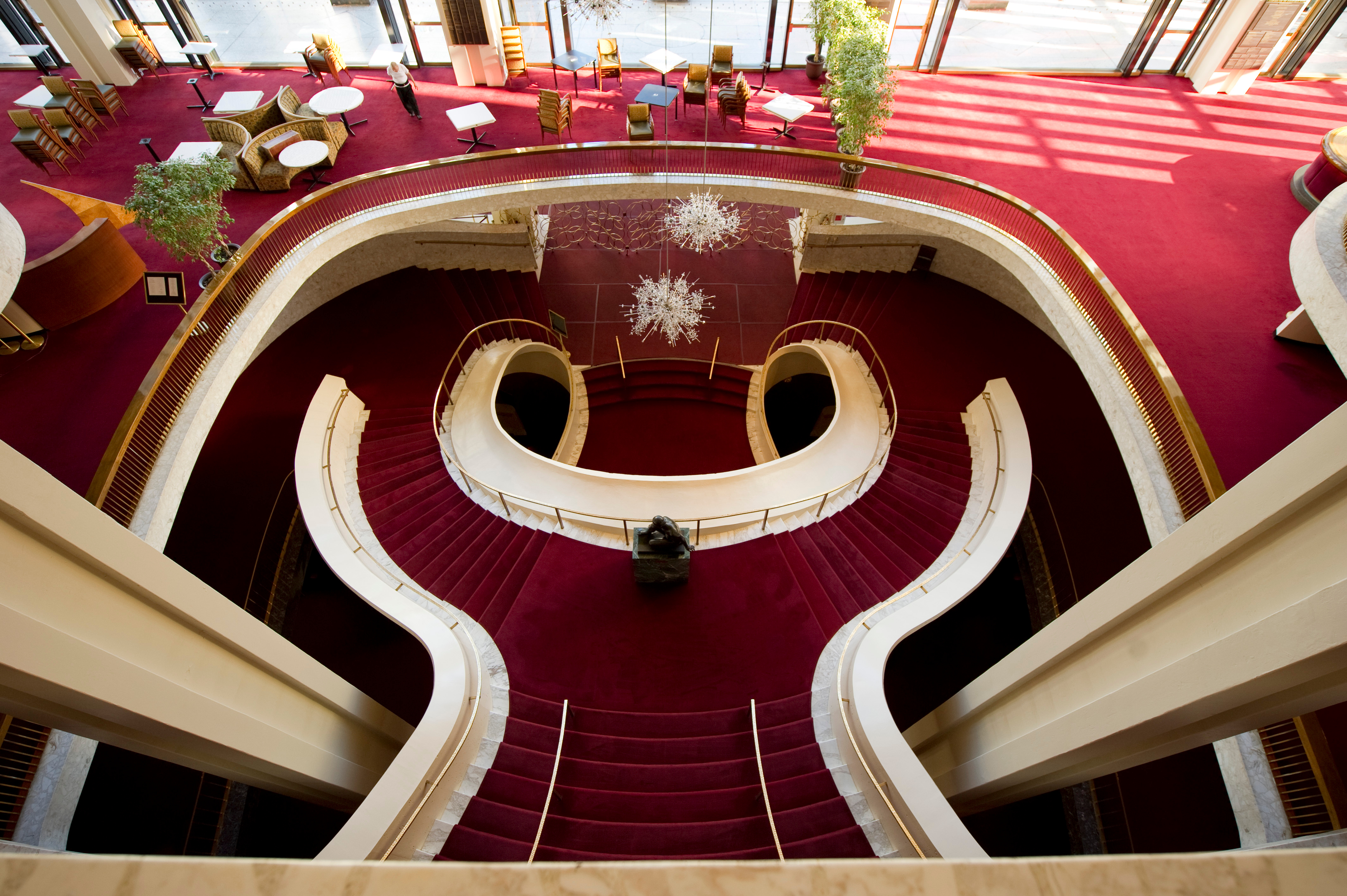 The swirls of the Metropolitan Opera's staircase and grand tier, as seen from above.