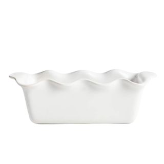 A white ruffled edged bread loaf pan