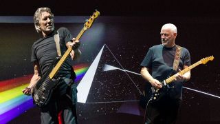 Roger Waters performing live on stage at Wembley Arena during a production of Pink Floyd's rock opera The Wall, on September 20, 2013 & David Gilmour performs at Royal Albert Hall on September 23, 2015 in London