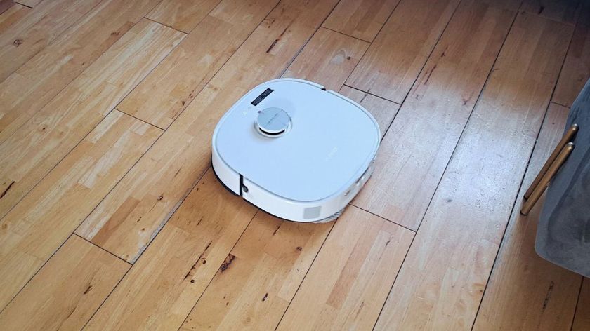Eureka J15 Pro Ultra Robot Vacuum and Mop on wooden floor