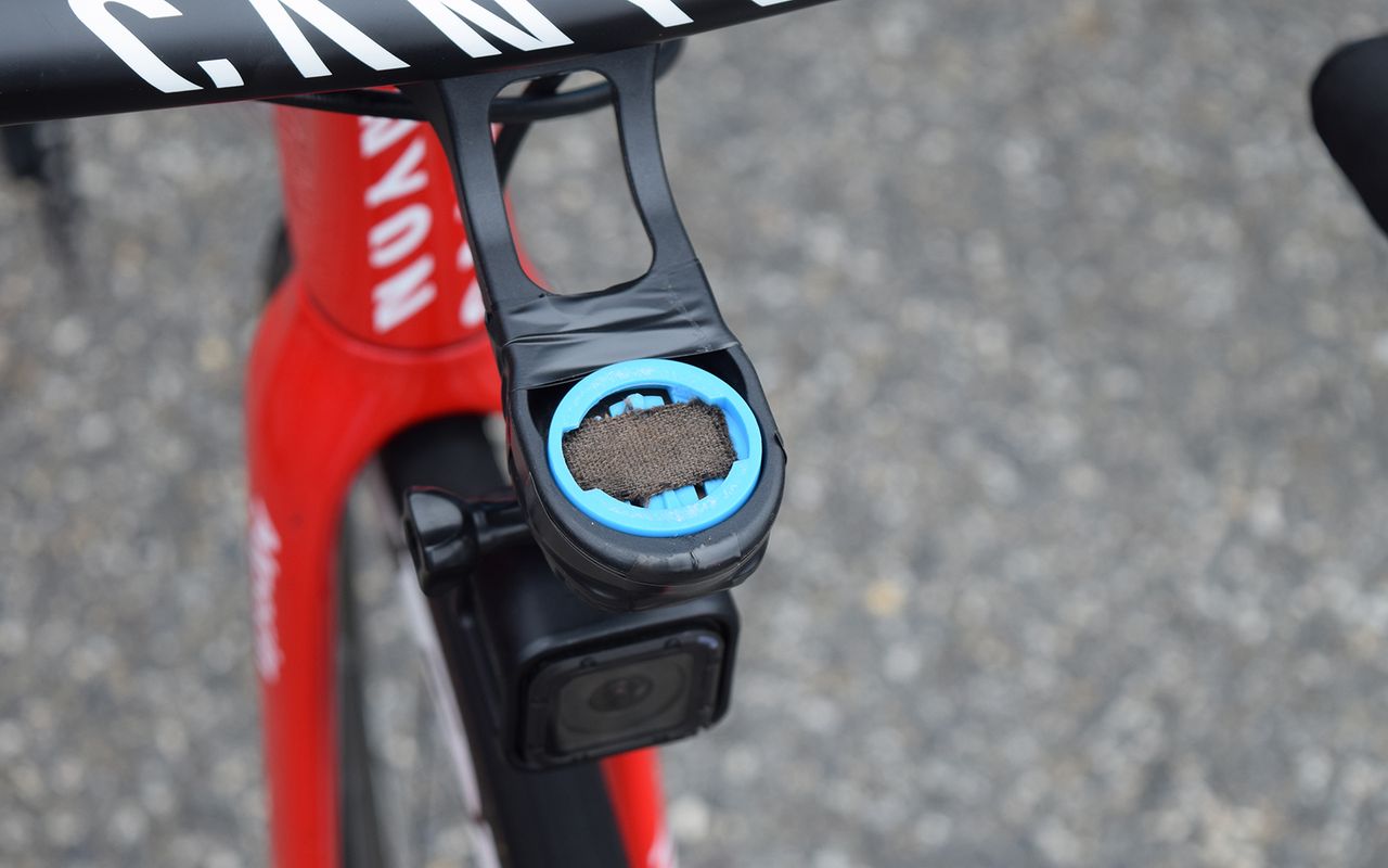 A small piece of tape inside the computer mount will give an added level of security and prevent any rattling