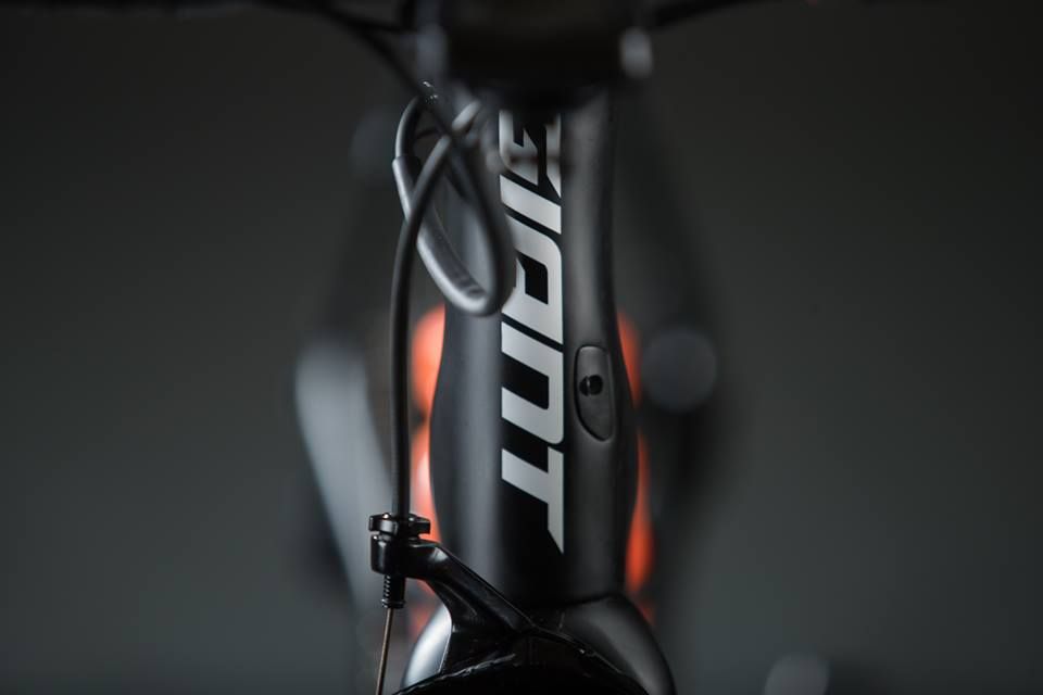 The low-key black design has contrasting white decals