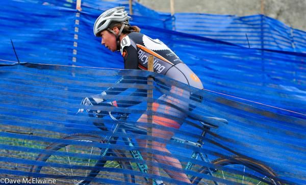 A racer zig-zagging through blue course markings