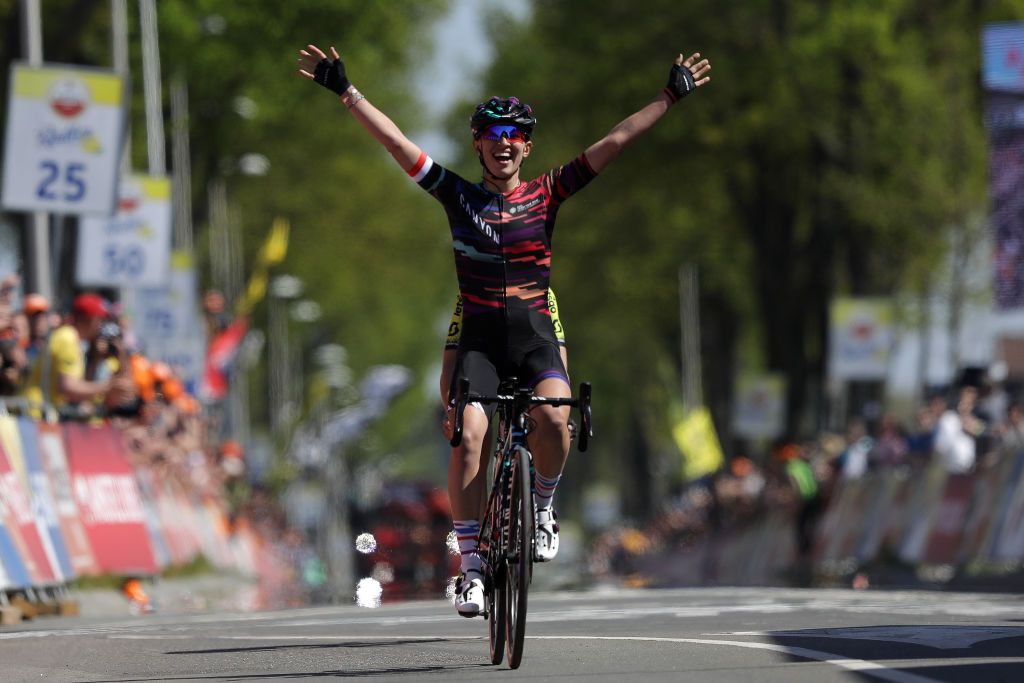 Niewiadoma celebrates her victory
