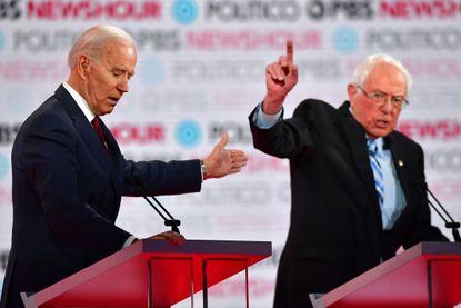 Joe Biden and Bernie Sanders on the debate stage