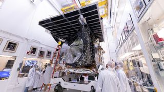 NASA's Psyche spacecraft is seen in early 2022 on its way to the vacuum chamber at the agency's Jet Propulsion Laboratory.