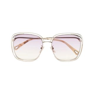 Clear framed glasses with purple gradient lens