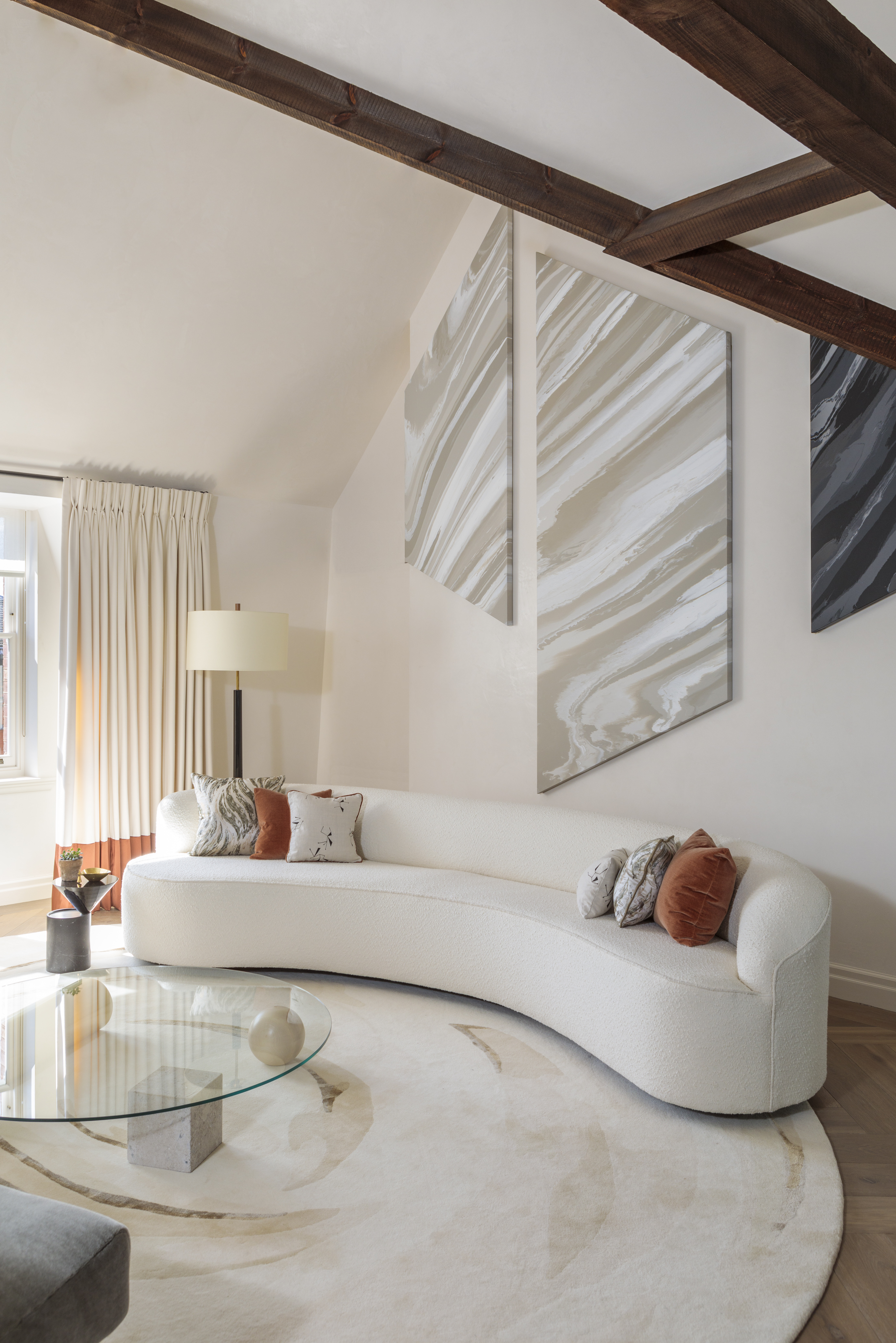 Modern living room with curved couch