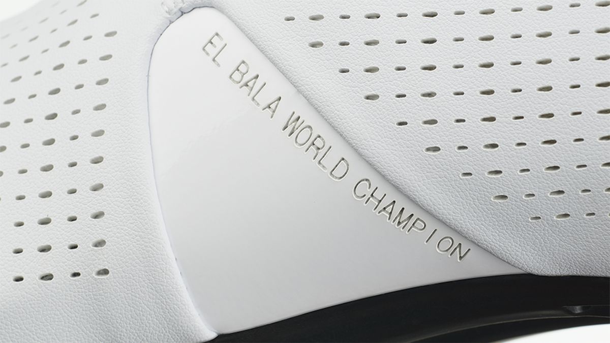 The instep of the shoe has the inscription "El Bala World Champion"