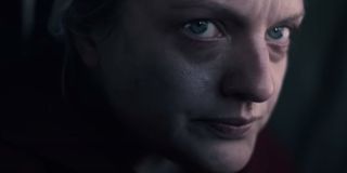 Elisabeth Moss showing worry on her face in The Handmaid's Tale.