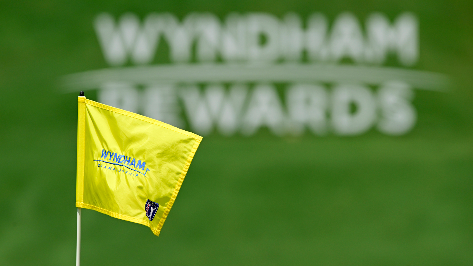 A Wyndham Championship flag blows in the wind