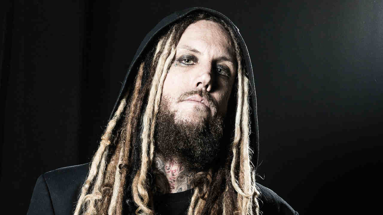 Korn guitarist Head posing for a photograph