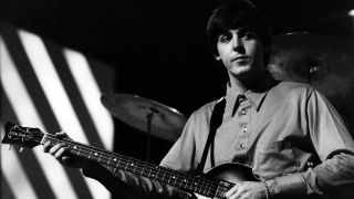 Paul McCartney with Höfner bass in 1964