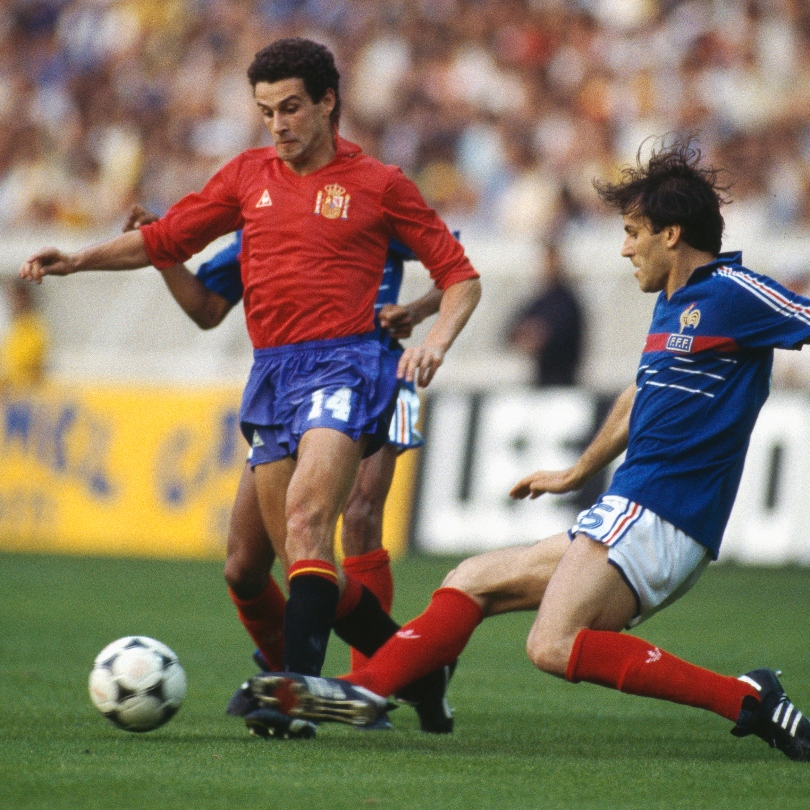 France's Yvon Le Roux challenges Spain's Julio Alberto Moreno in the final of Euro 1984.