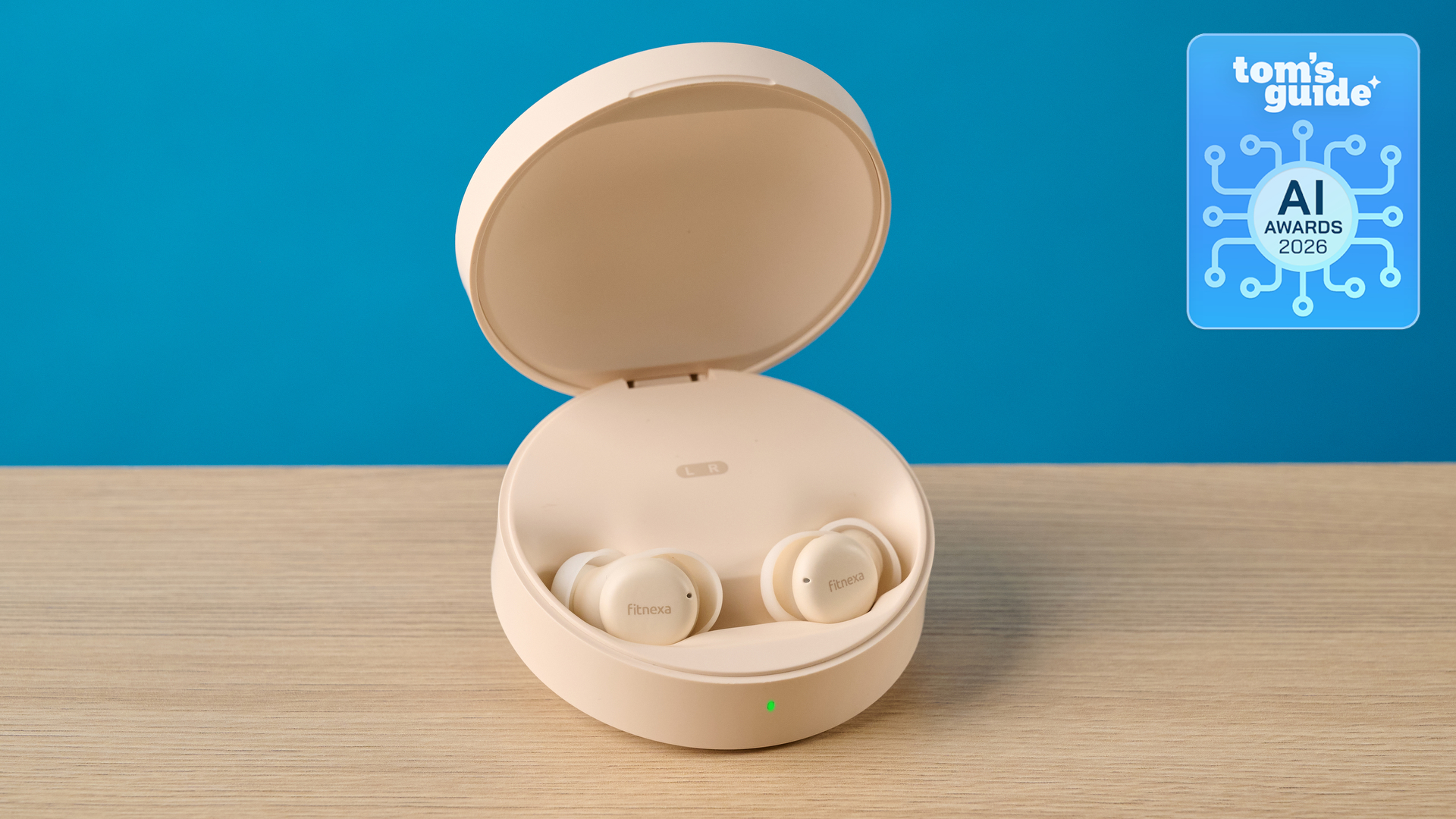 The Fitnexa SomniPods 2 in a case on a table with a Tom's Guide AI Awards 2026 badge