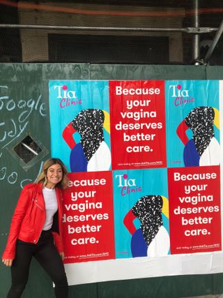 Tia CEO Carolyn Witte next to an advertisement for the NYC Tia Clinic