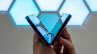 Samsung Galaxy Z Fold 4 folded into a V to look like the Roman numeral for 5