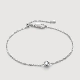 flat lay of silver bracelet 