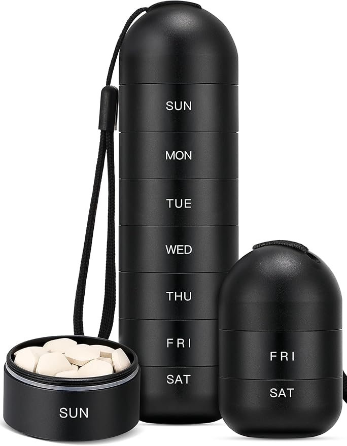 A black Zannaki travel pill organizer