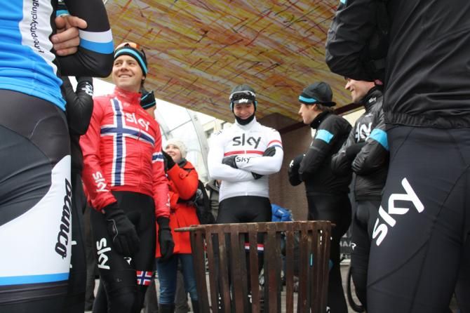 Team Sky keep warm before the start of Gent-Wevelgem