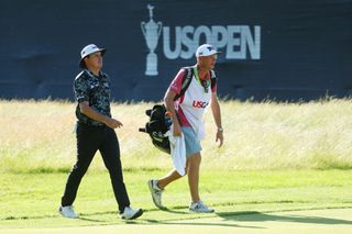 Joel Dahmen and his caddie walking at the 2022 US Open