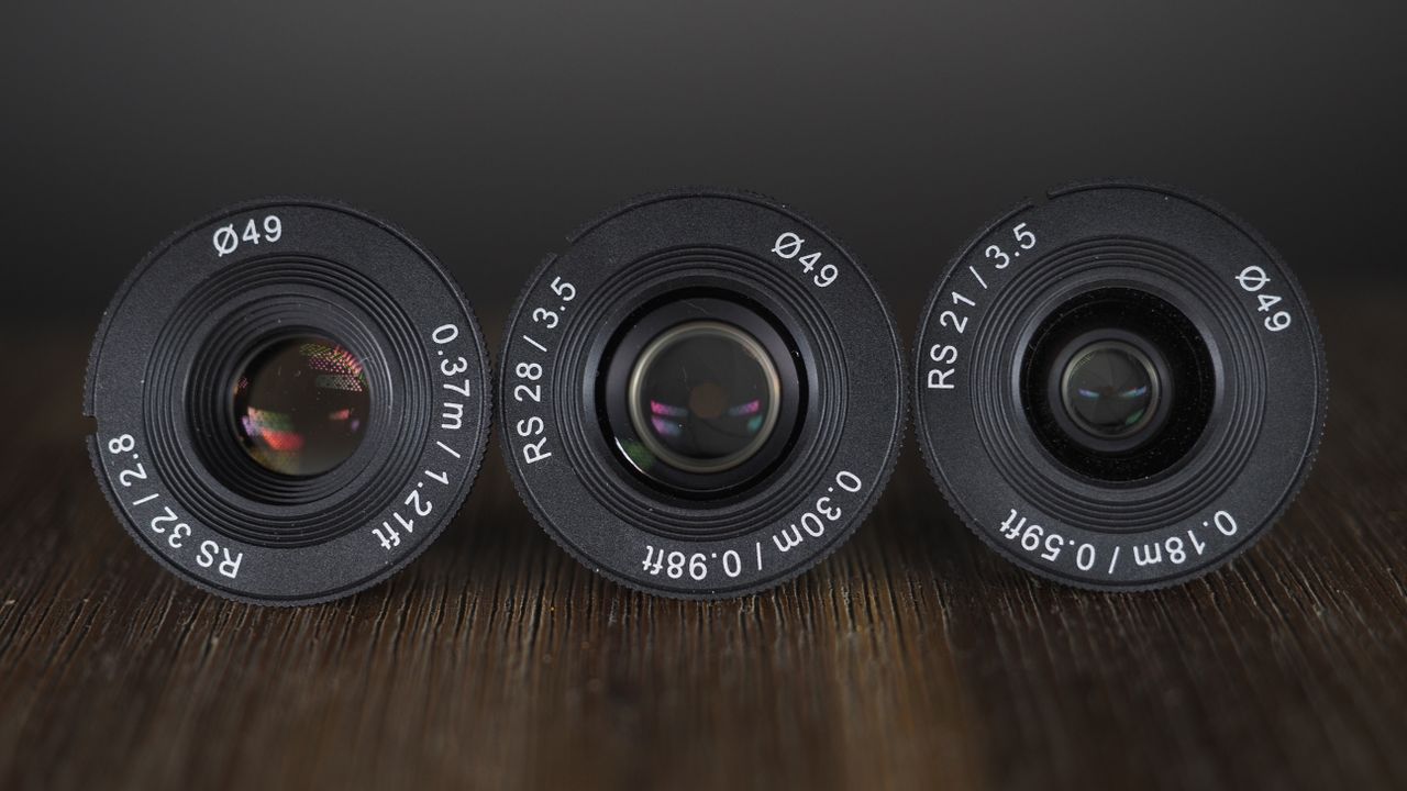Samyang Remaster Slim lenses on a wooden surface