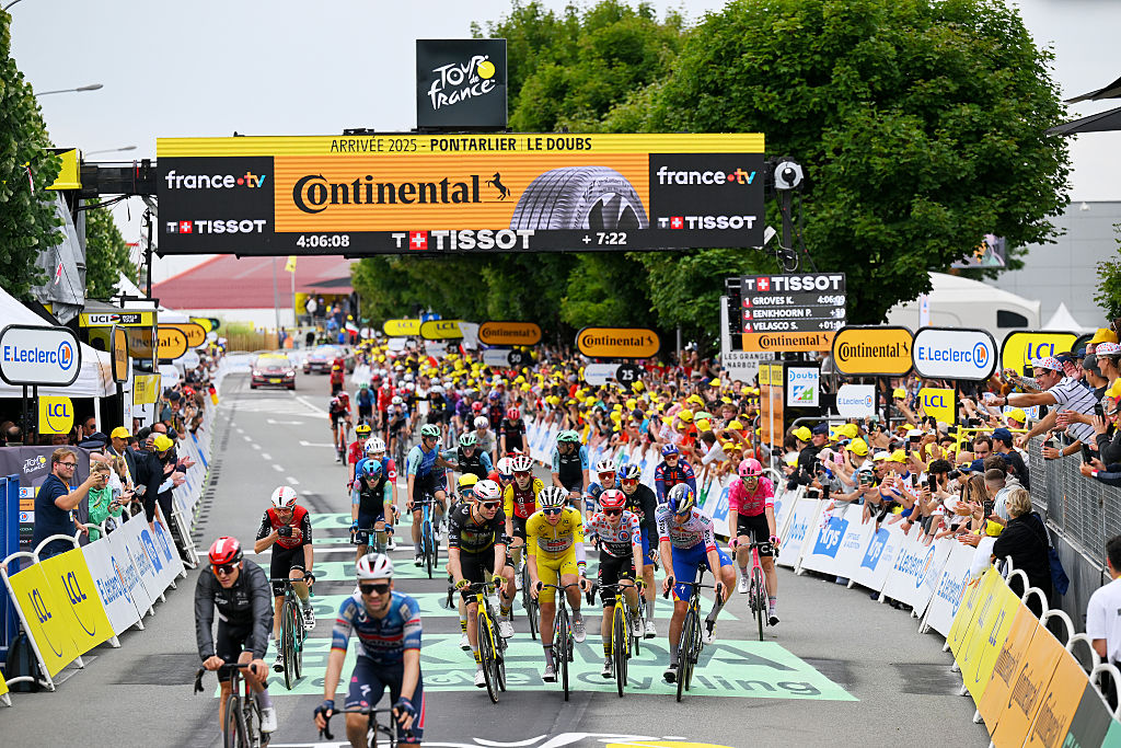 PONTARLIER, FRANCE - JULY 26: (L-R) Wout Van Aert of Belgium and Team Visma | Lease a Bike, Tadej Pogacar of Slovenia and UAE Team Emirates - XRG - Yellow Leader Jersey, Jonas Vingegaard of Denmark and Team Visma | Lease a Bike - Polka Dot Mountain Jersey and Mick Van Dijke of Netherlands and Team Red Bull - BORA - hansgrohe cross the finish line during the 112th Tour de France 2025, Stage 20 a 184.2km stage from Nantua to Pontarlier / #UCIWT / on July 26, 2025 in Pontarlier, France. (Photo by Tim de Waele/Getty Images)