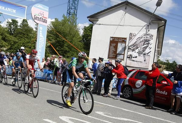 Mountains leader Paul Voss (Milram) wins the stage's second KOM at Castellania.