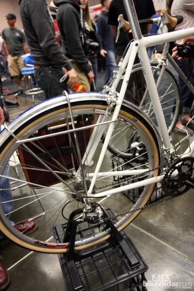 The rear end of this Steve Rex all-road bike is clean and purposeful. Note the full-sized frame pump tucked in along the non-driveside seat stay.