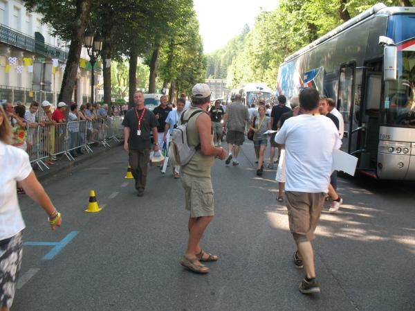 Cones were put place to make sure the team cars can park near the team's bus