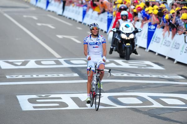 Thibaut Pinot crosses the line to win the stage in Porrentruy