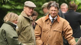 Prince Philip, Duke of Edinburgh (C) chats to Alan Titchmarsh (R) as he prepares to judge the obstacles event during the Royal Windsor Horse Show 2009 on May 16, 2009