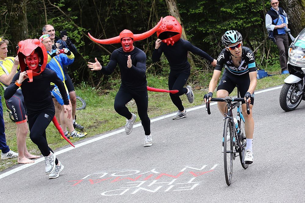 Some interesting looking fans cheers on Mikel Nieve