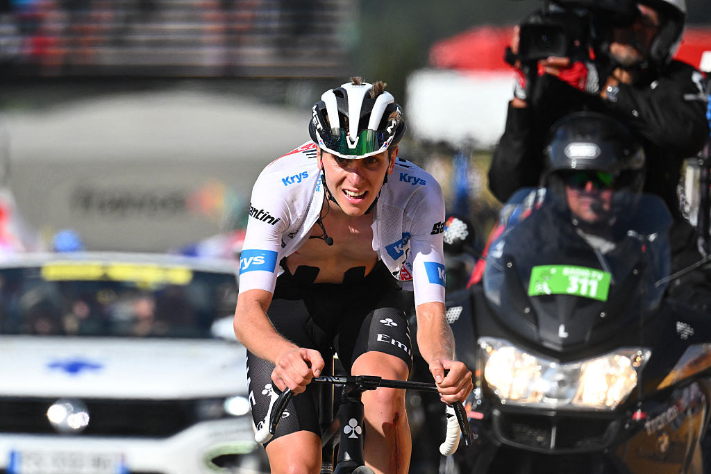 UAE Team Emirates' Slovenian rider Tadej Pogacar wearing the best young rider's white jersey cycles in the ascent of Col de la Loze in the final kilometres of the 17th stage of the 110th edition of the Tour de France cycling race, 166 km between Saint-Gervais Mont-Blanc and Courchevel, in the French Alps, on July 19, 2023. (Photo by Marco BERTORELLO / AFP)