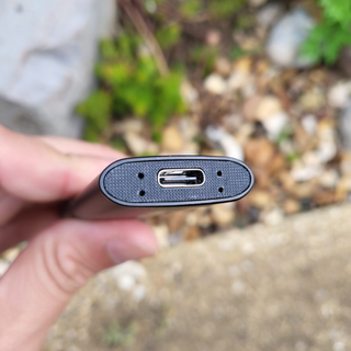 Base of the Netac Z Slim showing the charging port during our tests