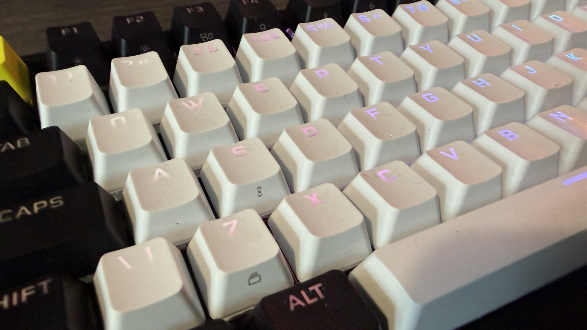 Corsair Makr Pro 75 gaming keyboard on a wooden desk