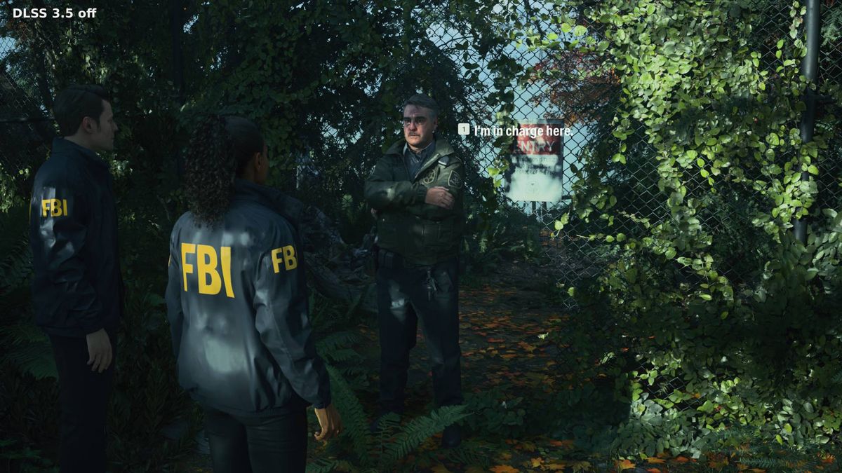Alan Wake 2 screenshot with Ray Reconstruction off next to NPC