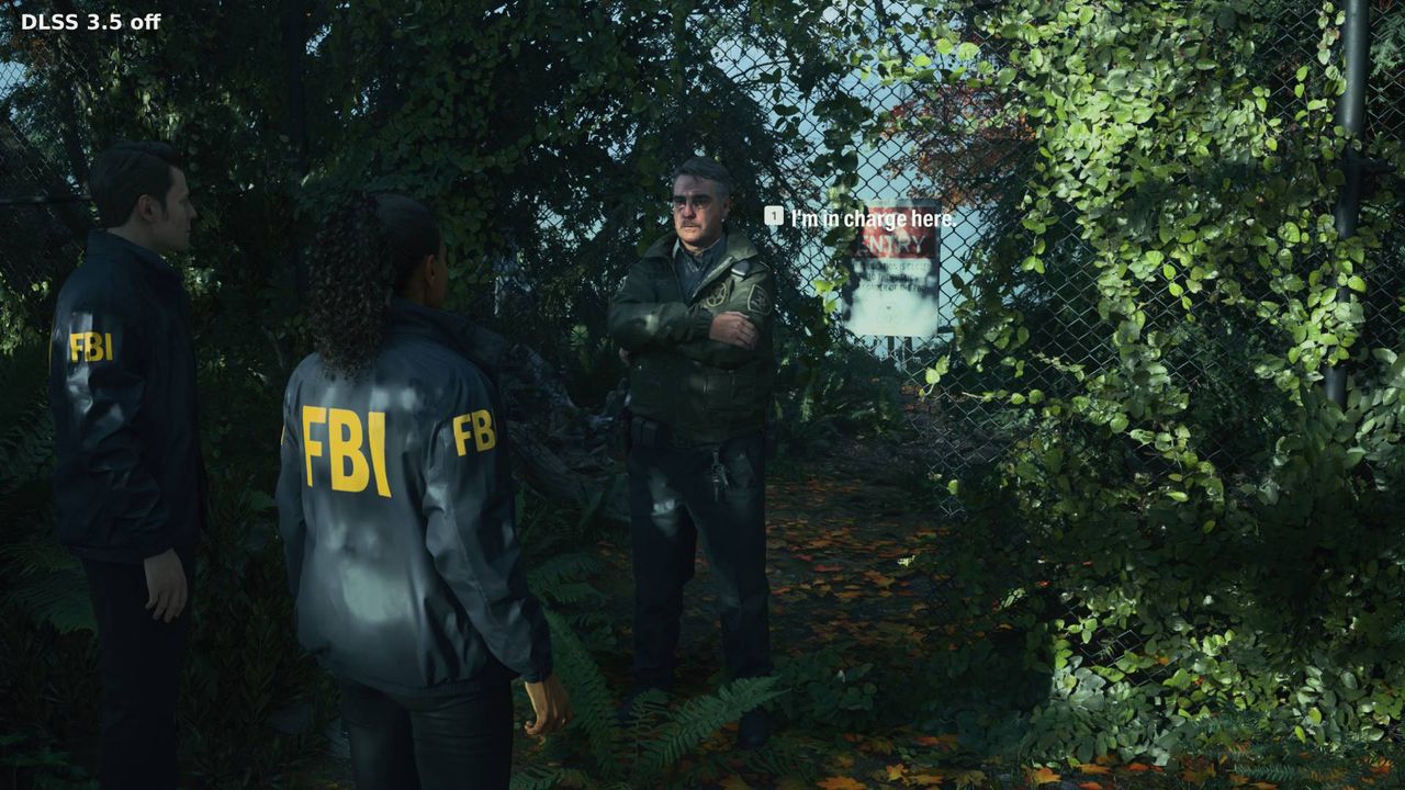 Alan Wake 2 screenshot with Ray Reconstruction off next to NPC