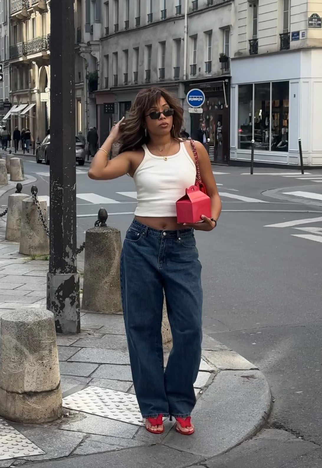Woman in a tank top and jeans