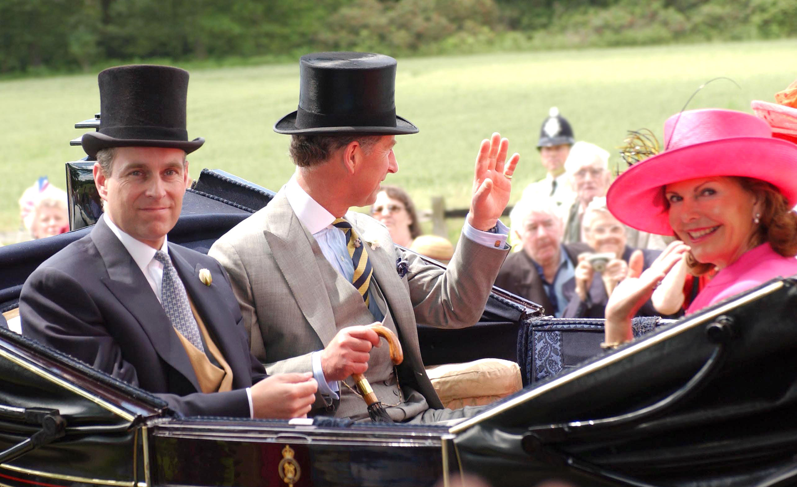 King Charles, Queen Silvia and Andrew riding in a carriage at Royal Ascot