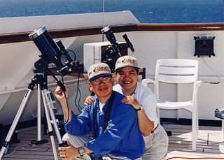 Veteran eclipse chasers Imelda Joson and Edwin Aguirre were all smiles after successfully observing the total solar eclipse on Feb. 26, 1998 aboard the MS Veendam in the Caribbean Sea.