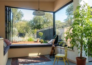 extension with bifold windows and window seat