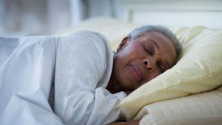 What is sleep hygiene? Image shows woman sleeping