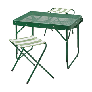 A green folding picnic table and a set of striped portable chairs
