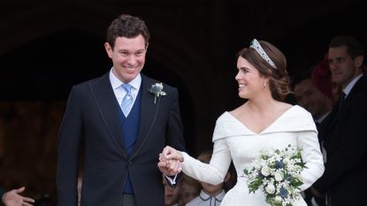 Princess Eugenie of York and Jack Brooksbank leave St George's Chapel in Windsor Castle following their wedding at St. George's Chapel on October 12, 2018