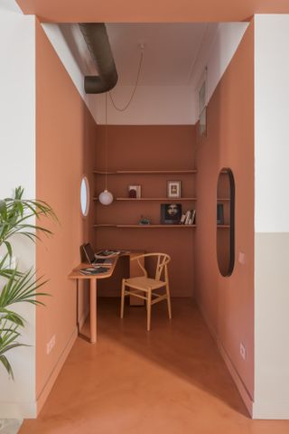 Desk nook painted in coral