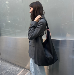 Fashion Features Editor Emma Childs tests the By Anthropologie The Love Knot Slouchy Bag