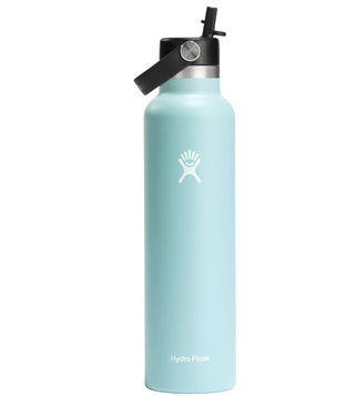 a blue hydroflask water bottle in front of a plain backdrop