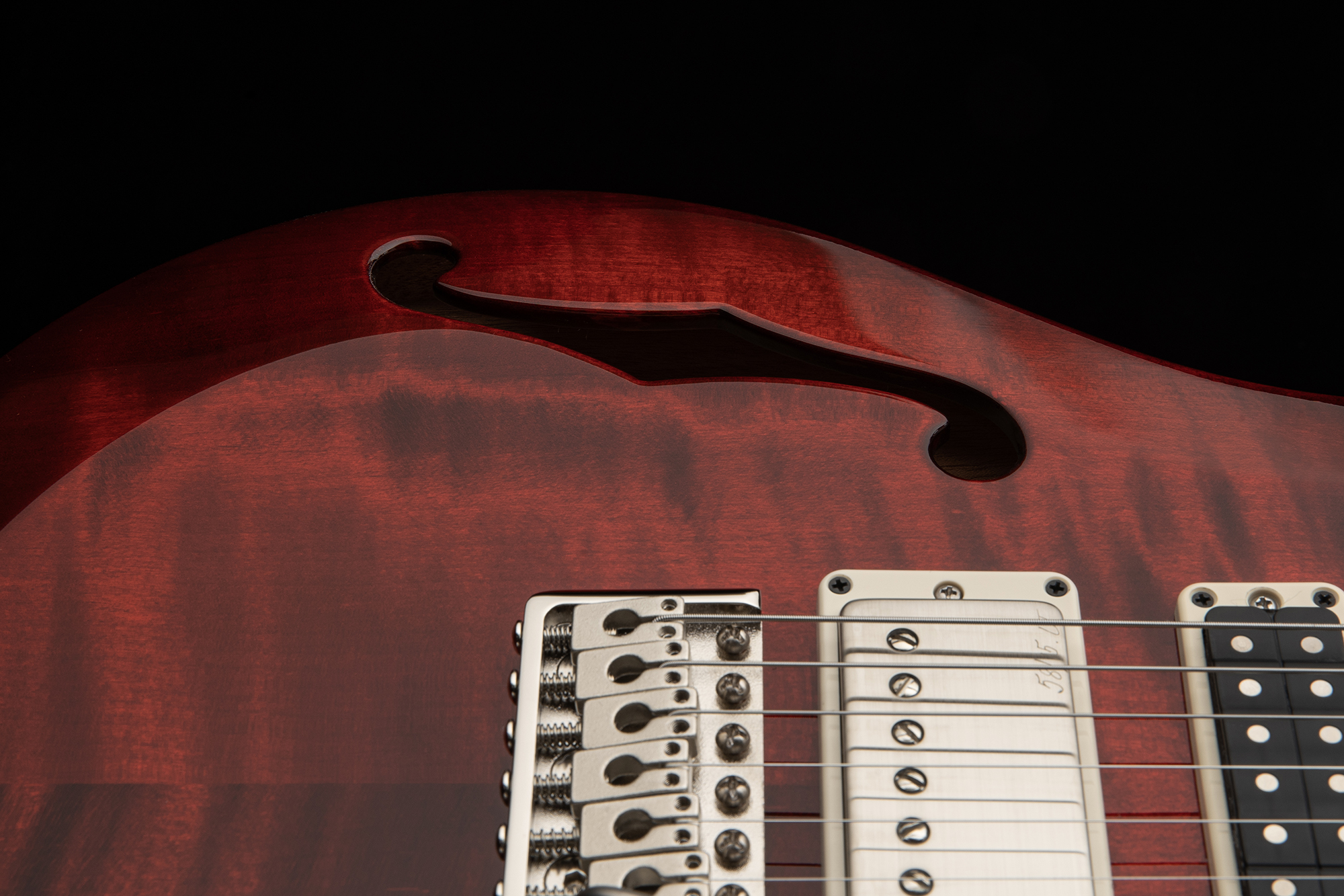 A photo of the PRS S2 Special Semi-Hollow in Fire Red Burst finish