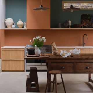 A large kitchen painted in Farrow & Ball's Marmelo and Douter